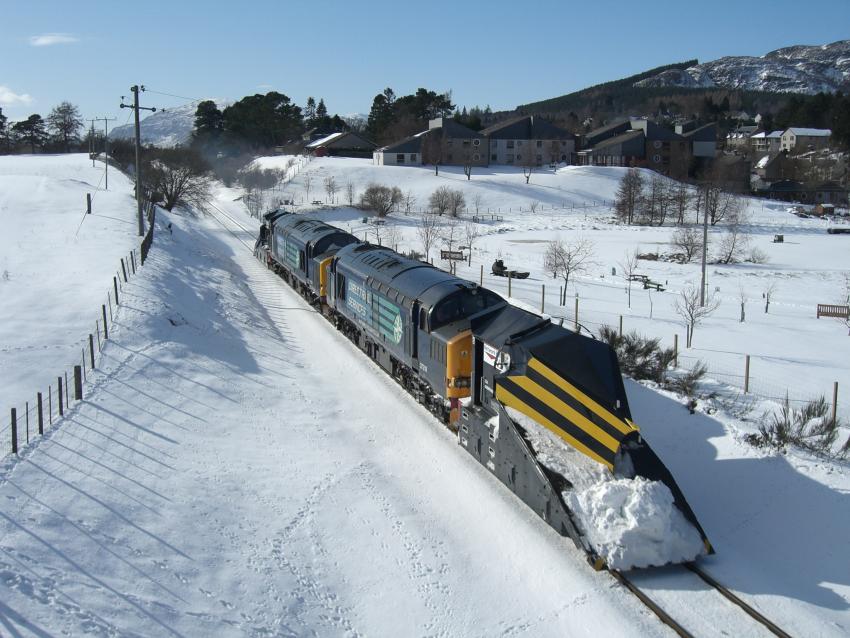 Snow plough train along Highland Main Line