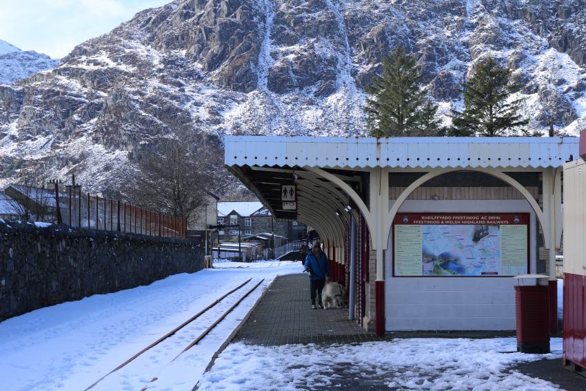 Station with snowy mountain in the background