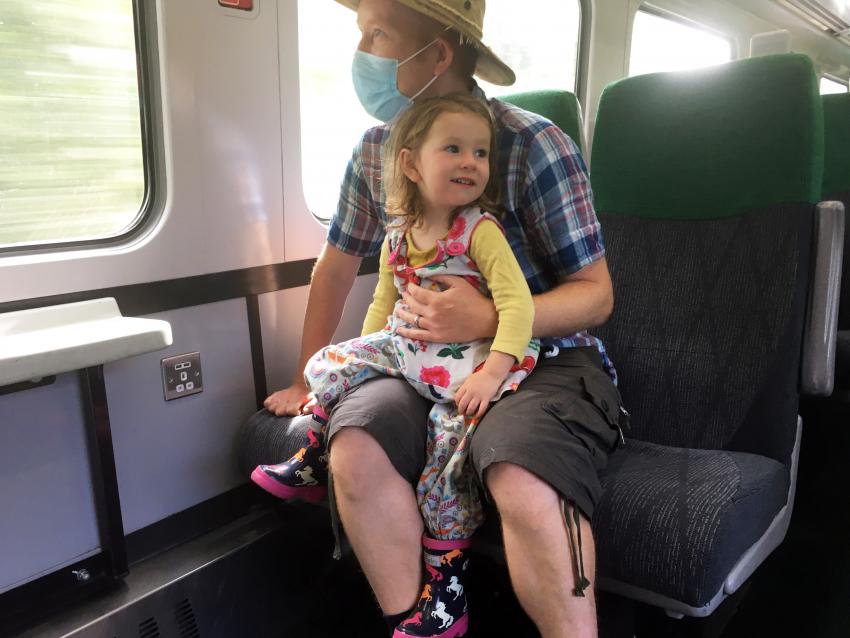 Family taking the train for days out by rail