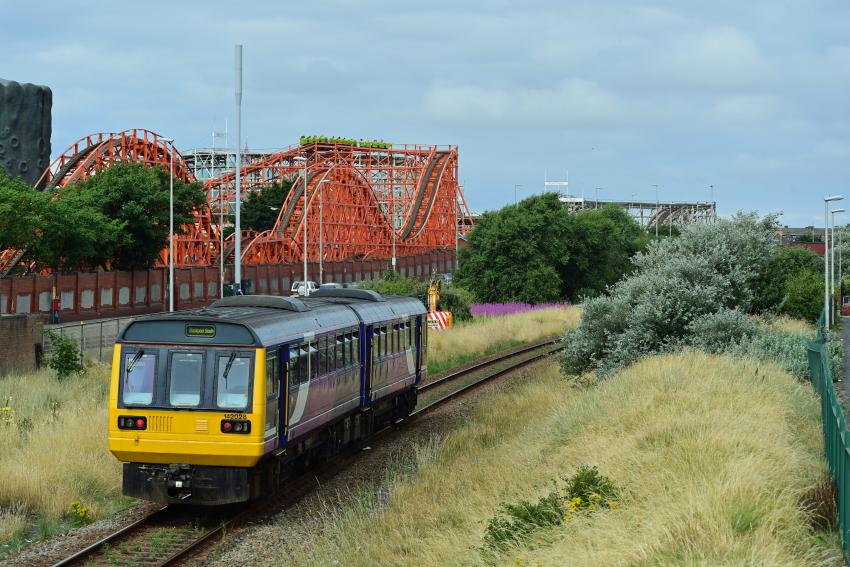 Train in front of Blackpool Pleasure Beach, South Fylde Line