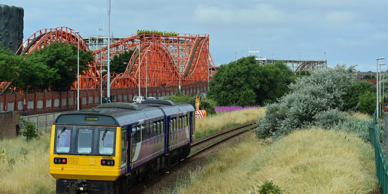 Train in front of Blackpool Pleasure Beach, South Fylde Line