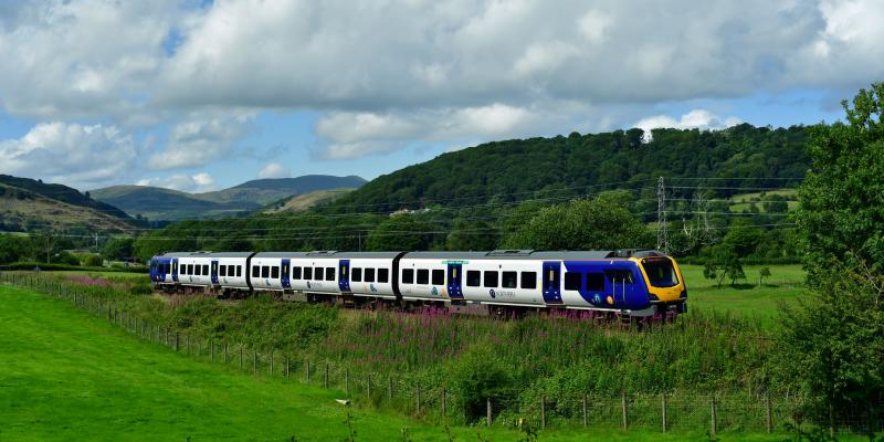 Train travelling through the Lake District to Windermere