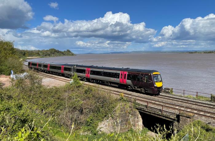 Train passing by estuary