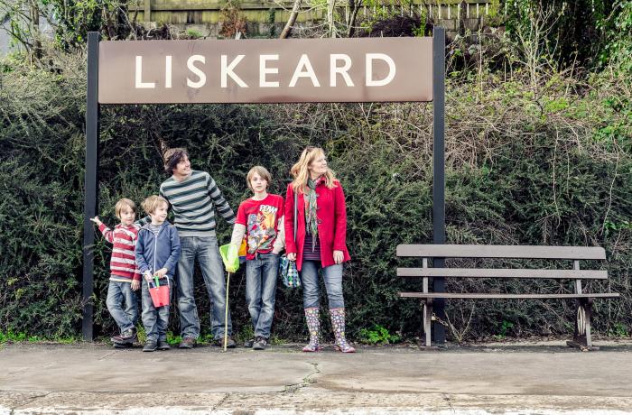 Family waiting for the train at Liskeard station